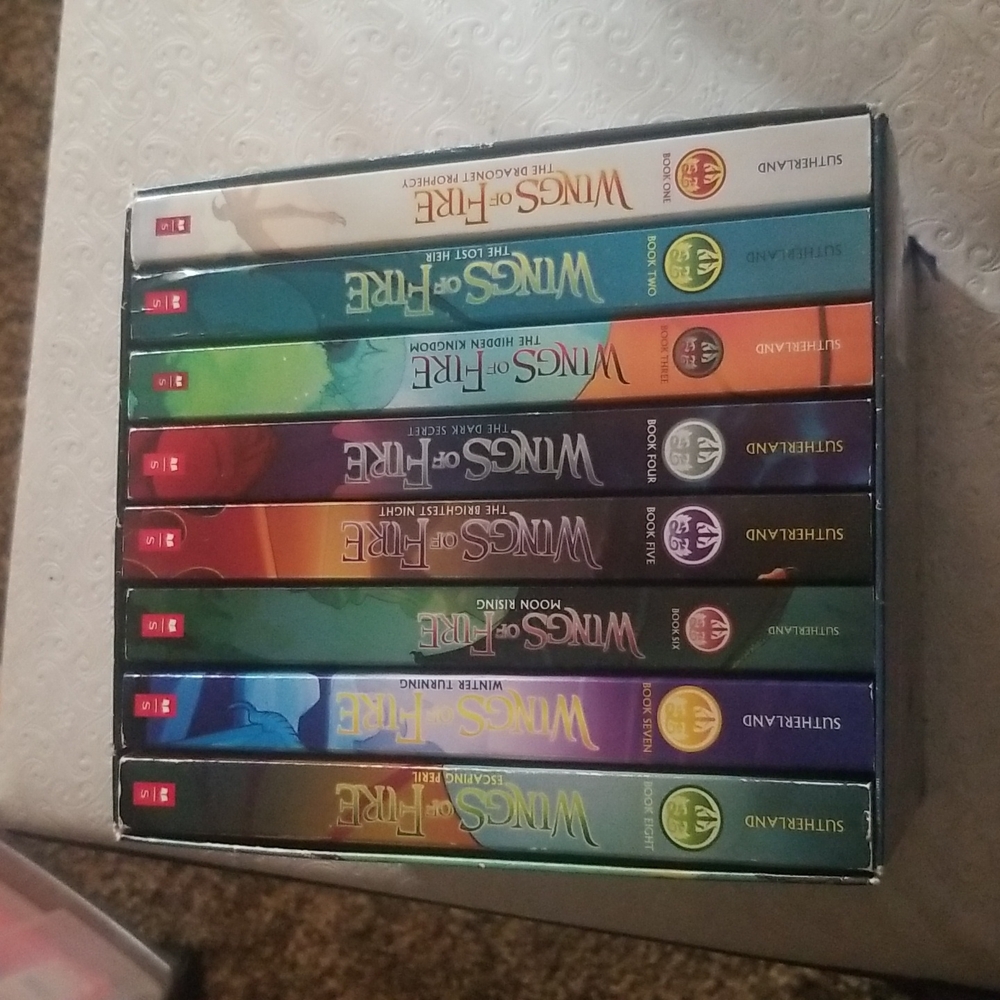 Books, set of 8 books Wings of Fire
